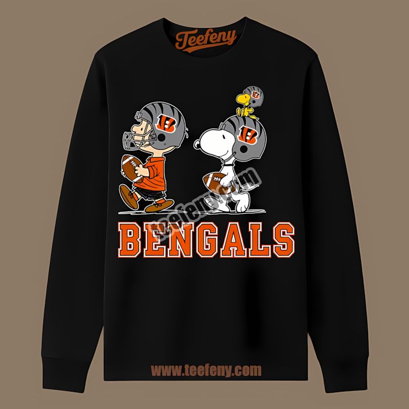 Cincinnati Bengals Charlie Brown And Snoopy Play Together Long Sleeve Cincinnati Bengals Charlie Brown And Snoopy Play Together Long Sleeve