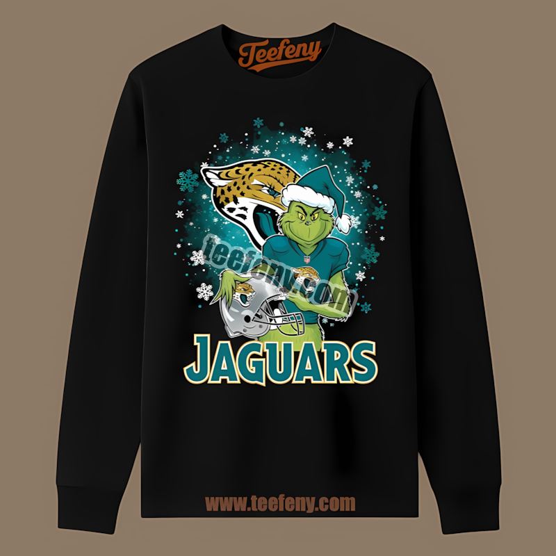 Jacksonville Jaguars Grinch Holding Helmet Sports Long Sleeve Jacksonville Jaguars Grinch Holding Helmet Sports Long Sleeve