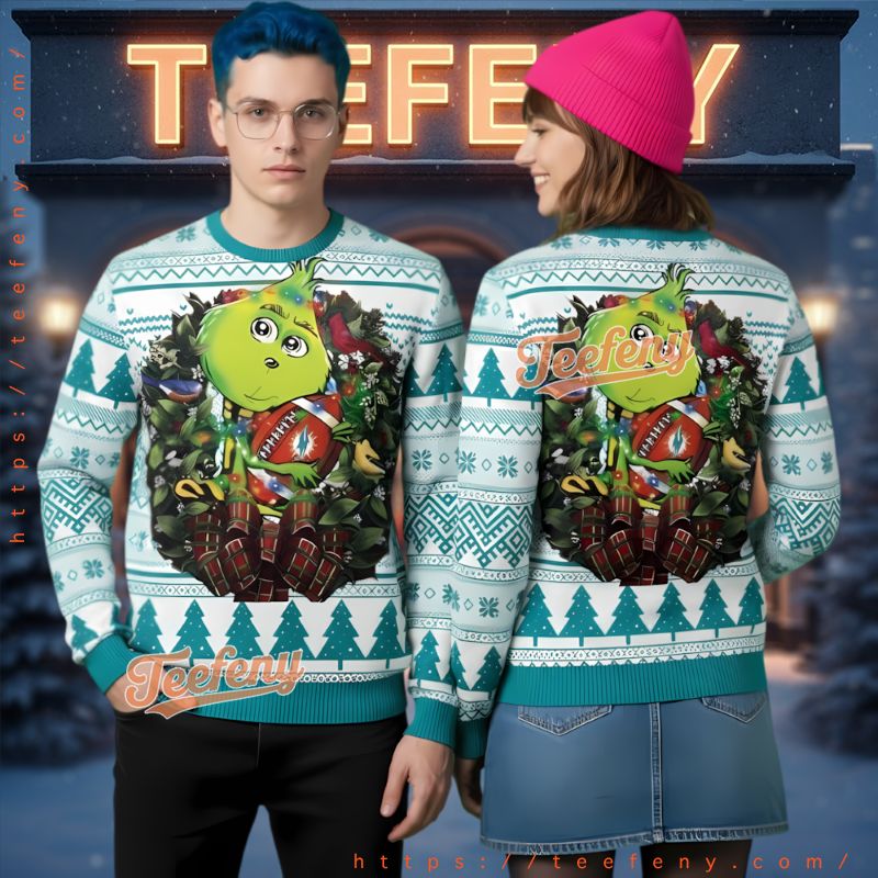 Miami Dolphins Grinch Hug Football Ugly Christmas Sweater Miami Dolphins Grinch Hug Football Ugly Christmas Sweater